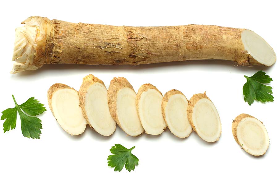 Sliced horseradish root with parsley